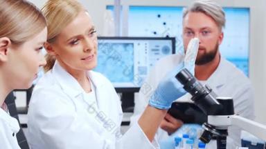 科学小组正在科学研究实验室里研究一种疫苗